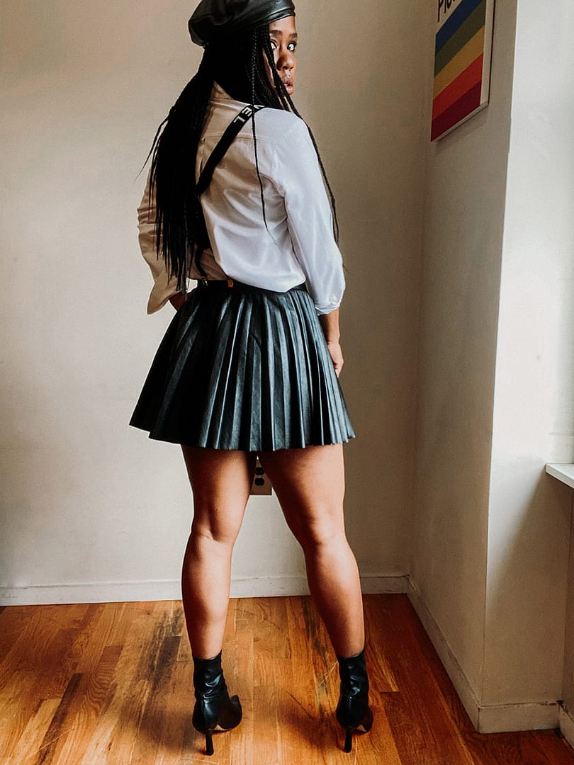 School girl chic with my Chanel suspenders and faux leather skirt